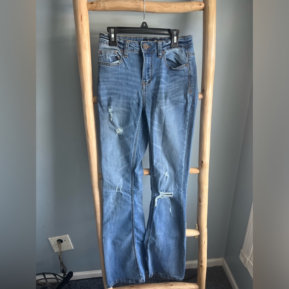 Boot cut skinny jeans. Ripped high rise.